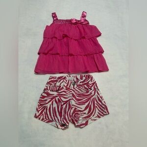 A matching set of pink Top and shorts